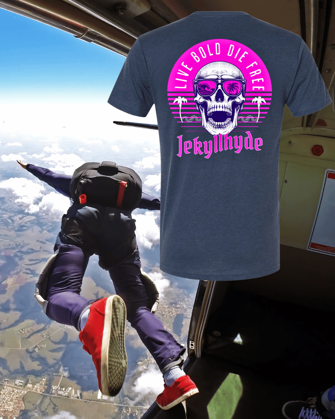 T-shirt with skull design and text 'Live Bold Die Free' displayed in front of a skydiver.