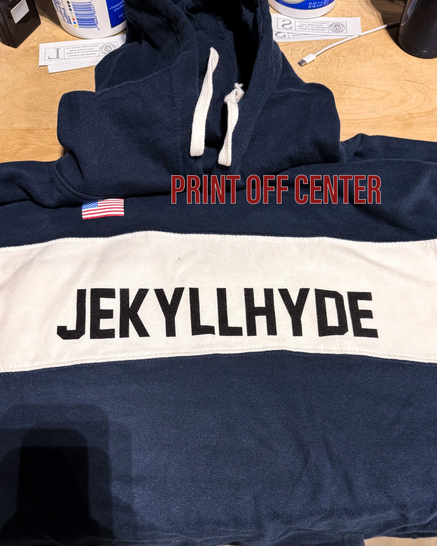 Flat lay of Jekyllhyde sweatshirt with logo off centered. 