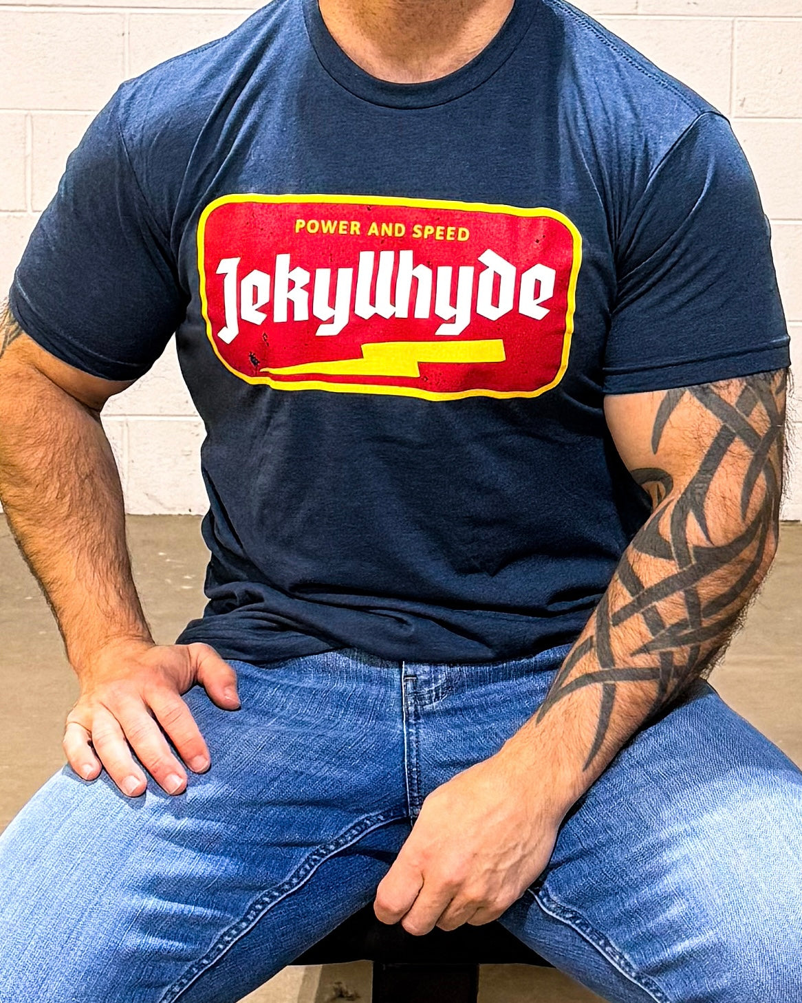 close up image of a navy tshirt with a lightning bolt and jekyllhyde name