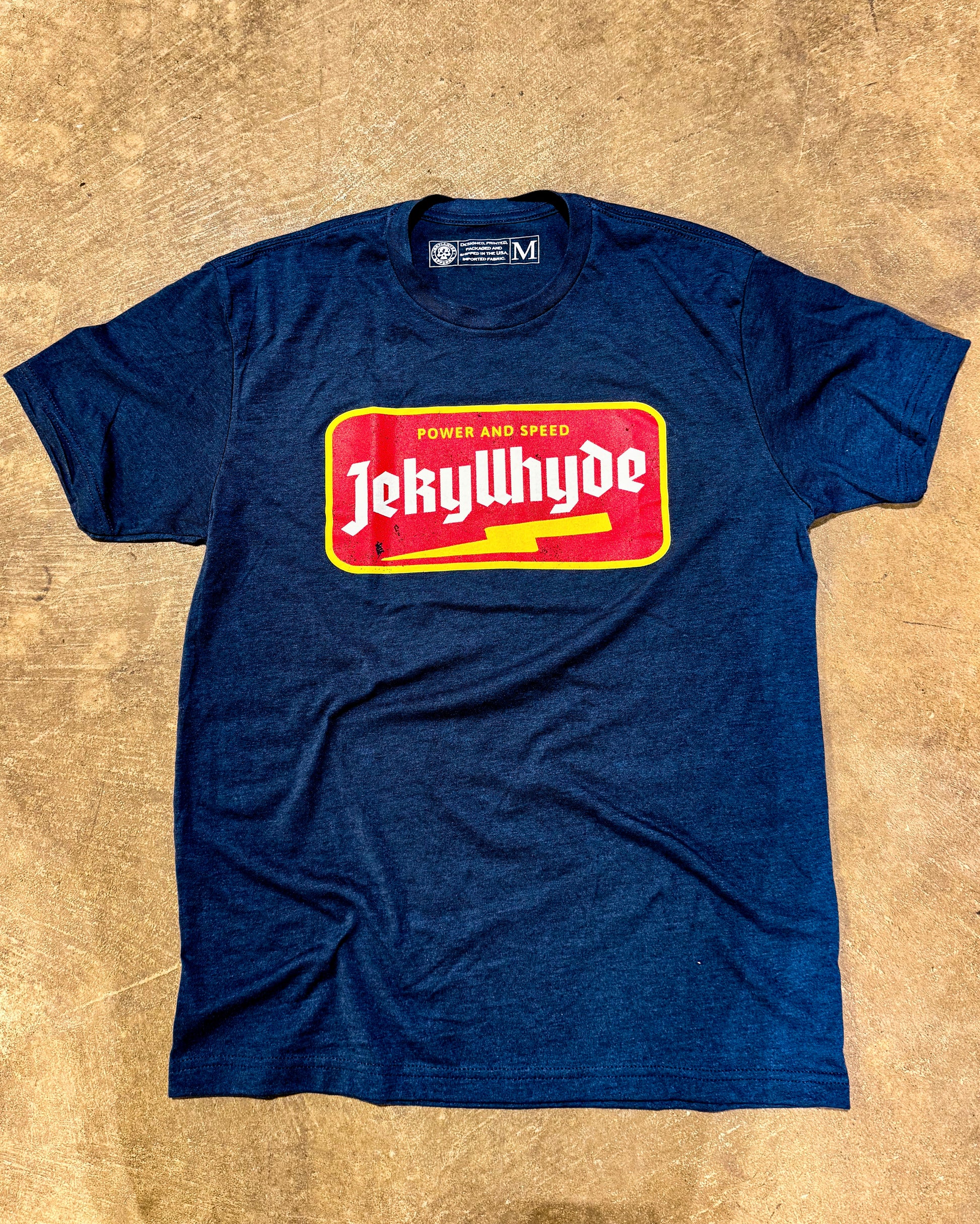 Flat lay of navy tshirt with lightning bolt jekyllhyde name
