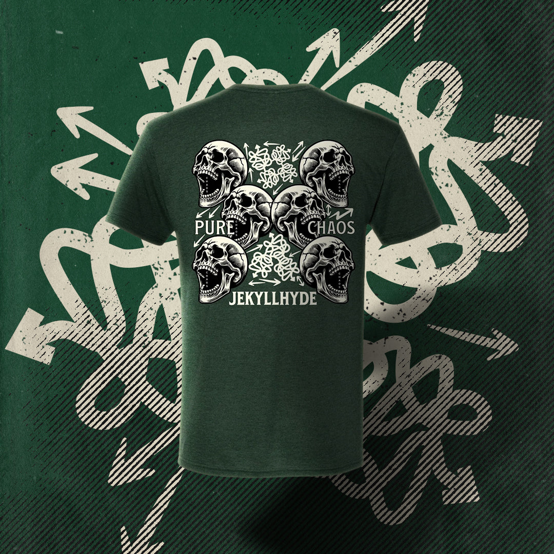 A green shirt with skulls and lots of arrows in all directions with a squiggly line background. 