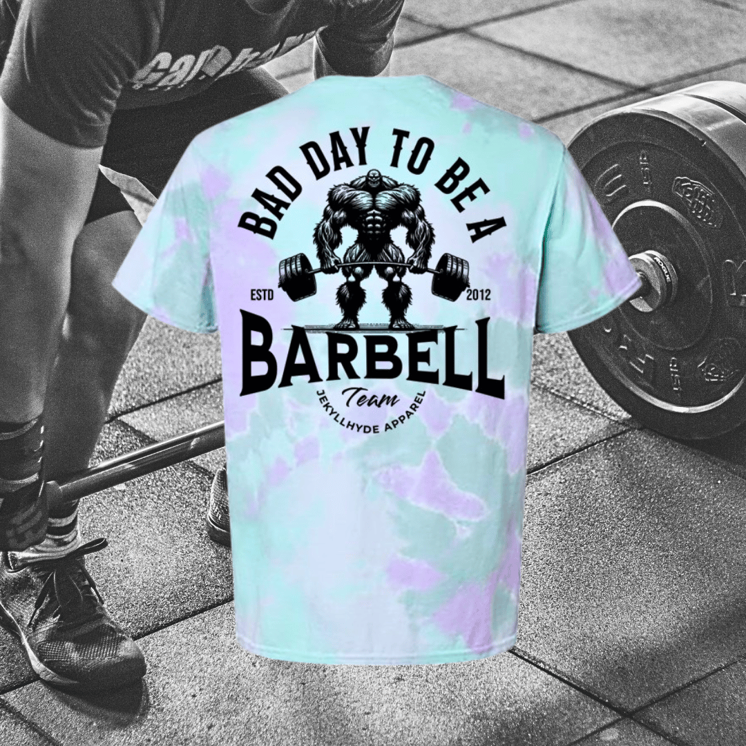 Tie Dye shirt with a monster lifting a barbell with fitness background. 