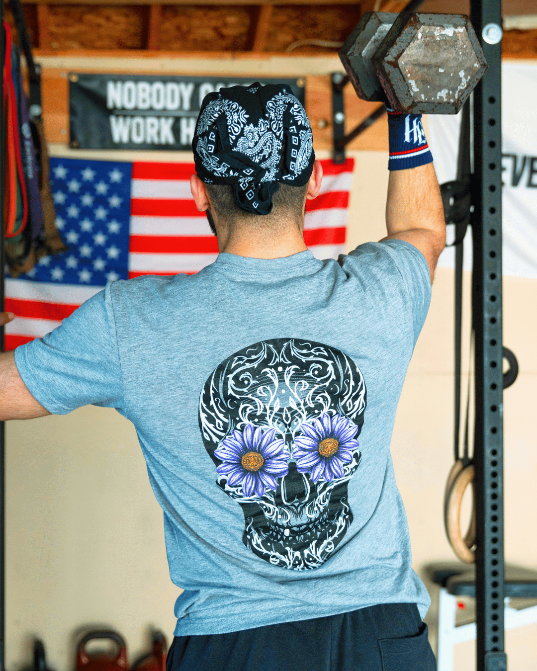 Man in a garage gym working out. 