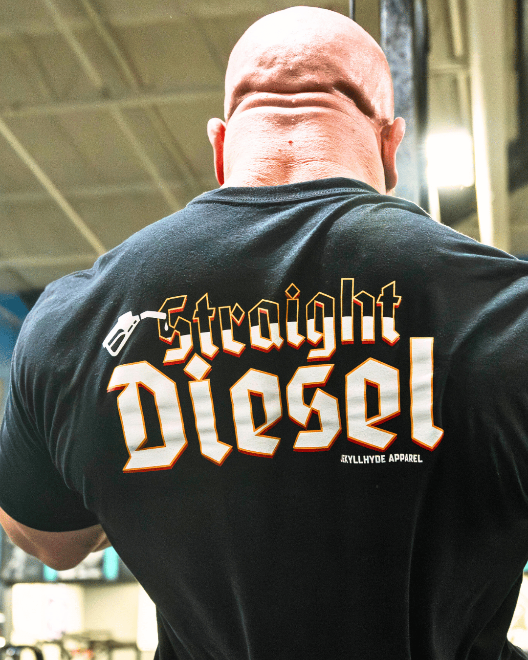 Muscular man in Straight diesel tshirt. 
