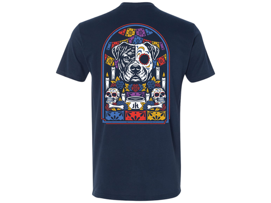 Navy t-shirt on white background with a Pitbull ofrenda on the back in a bunch of colors. 