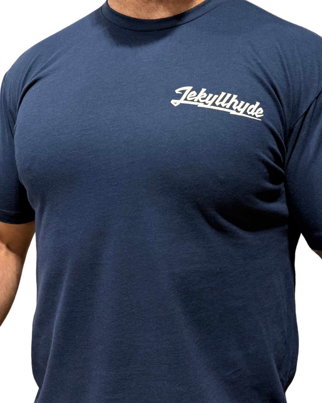 The front of a Navy shirt with a Jekllhyde logo in white on the left chest. 