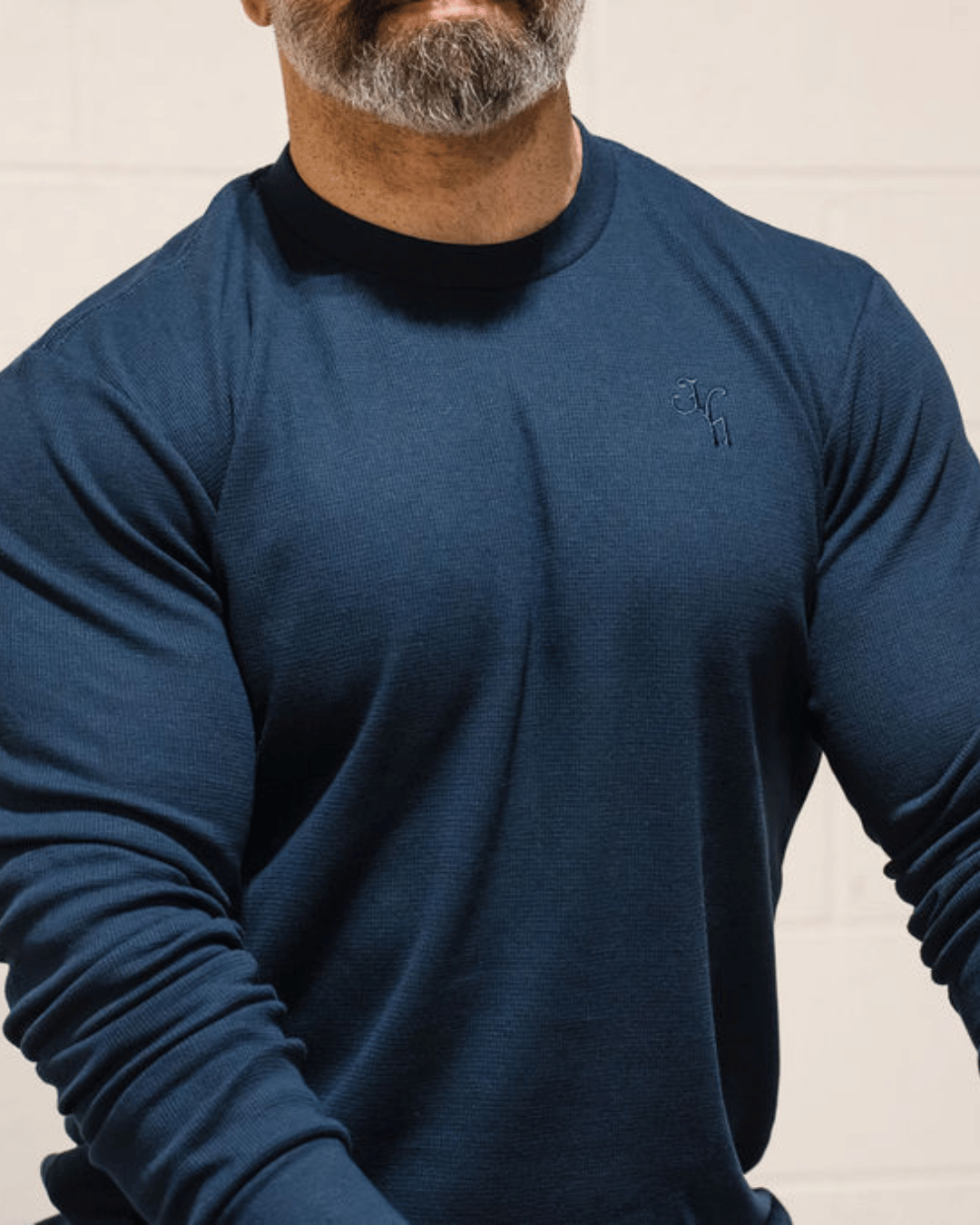 Close up of a navy thermal worn by a man. 