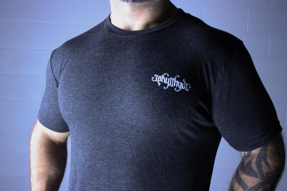 Front of a black tshirt with Jekyllhyde logo on left chest. 