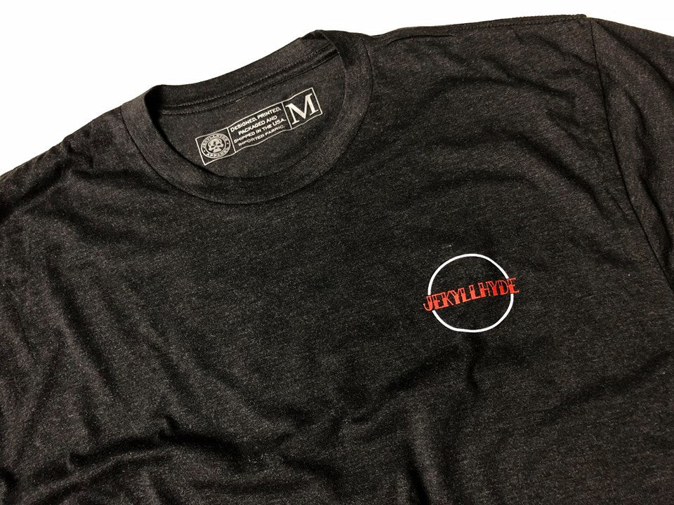 Black tshirt on a white background with jekyllhyde logo on the left chest. 