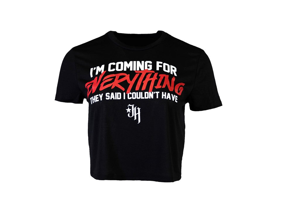 A black crop top that says "I'm coming for everything they said I couldn't have." 