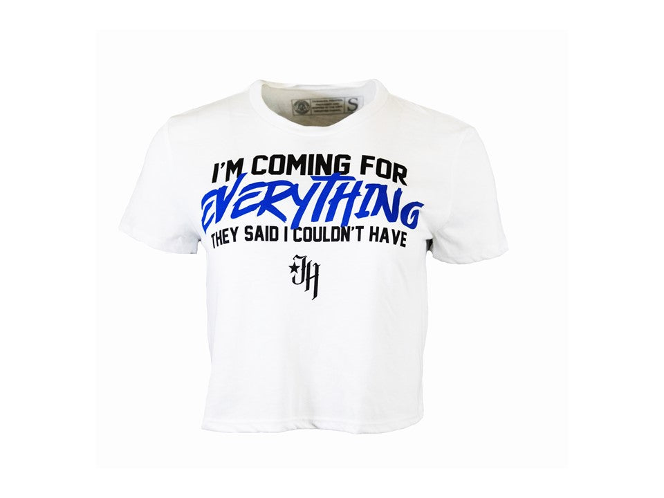 A white crop top that says "I'm coming for everything they said I couldn't have." 
