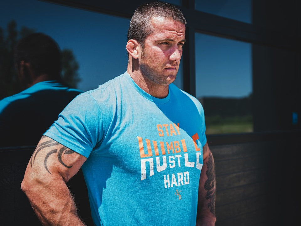 Muscular man in a blue shirt