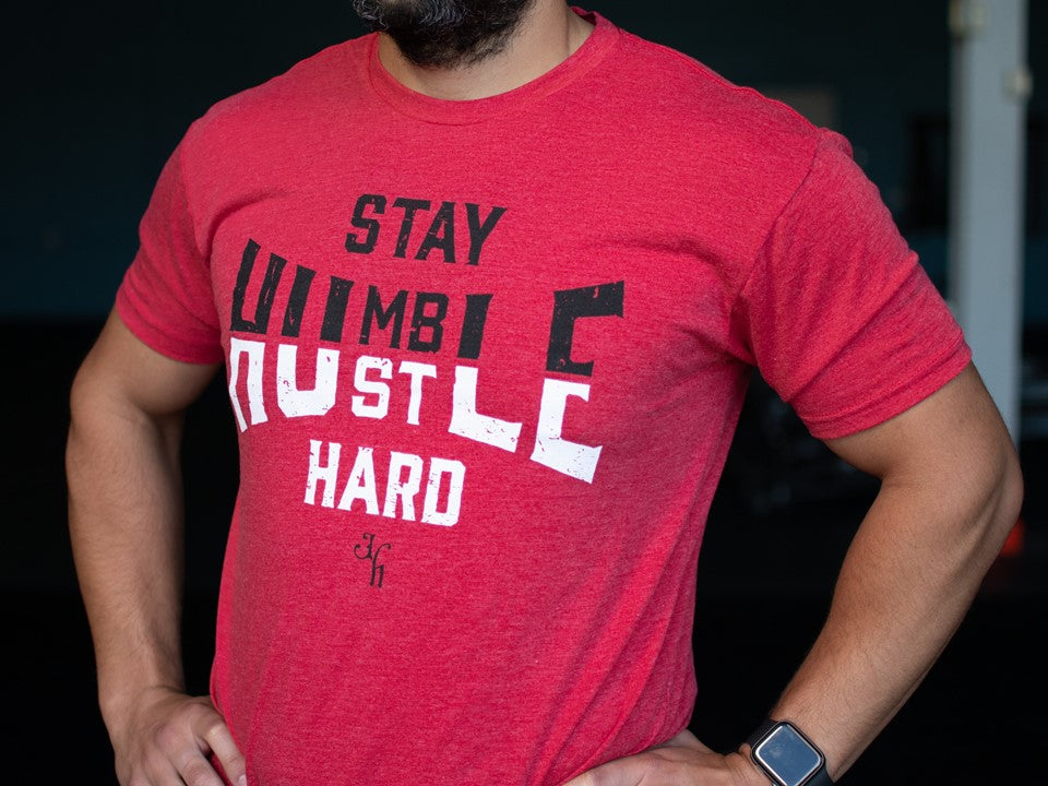 Red shirt with black and white text on the front. 