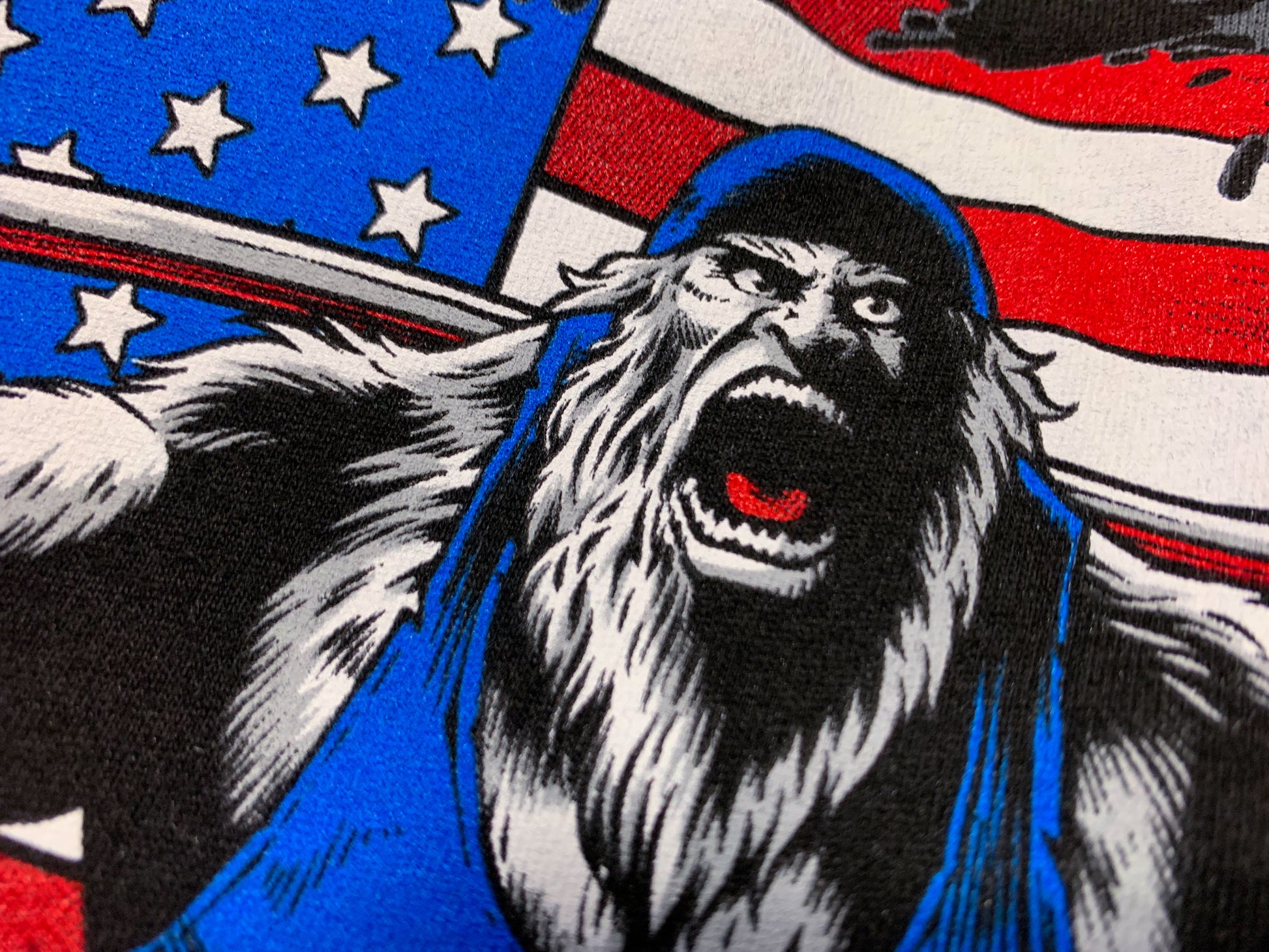 Print of Sasquatch screaming with an American flag background. 