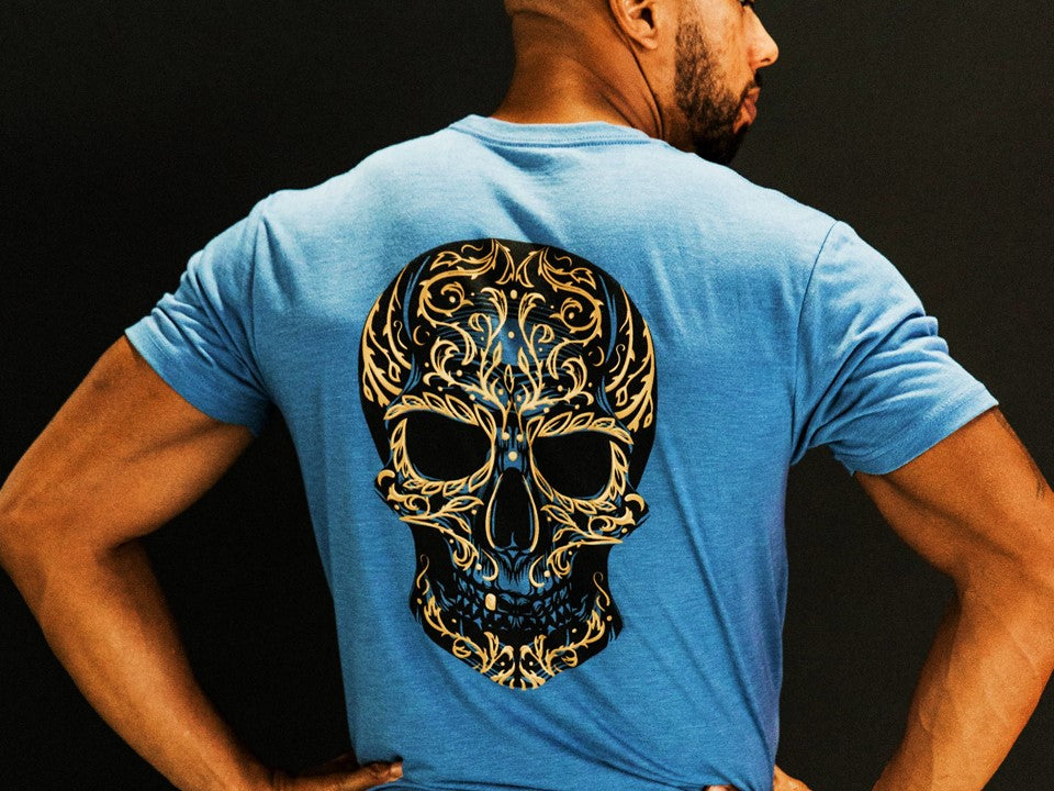 Sugar skull on the back of a blue t-shirt. 
