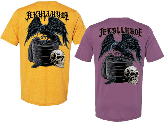 Yellow and purple t-shirts with a black raven, skull, and weights design on a white background.