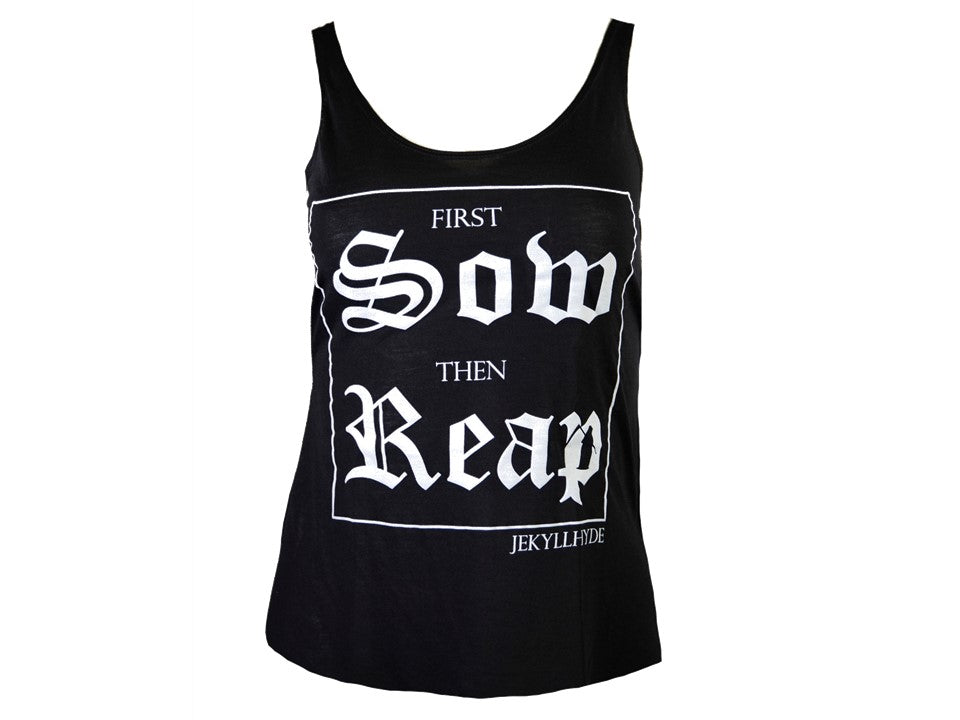 Black tank top with white text on a white background